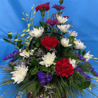 #67 Basket of Carnations, Dendrobiums, Cushion Poms, Statice, And Caspia